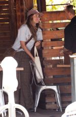 OLIVIA WILDE Out with a Male Friend at All Time Cafe in Los Angeles 04/07/2023