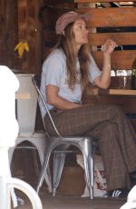 OLIVIA WILDE Out with a Male Friend at All Time Cafe in Los Angeles 04/07/2023