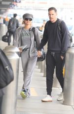 PARIS HILTON and Carter Reum Catch a Flight Out of Los Angeles 04/26/2023