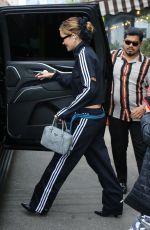 RITA ORA Leaves Bowery Hotel in a Adidas Track Suit in New York 04/27/2023