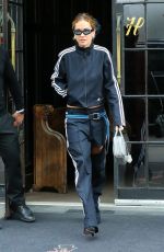 RITA ORA Leaves Bowery Hotel in a Adidas Track Suit in New York 04/27/2023