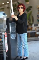 SHARON OSBOURNE Waits for Her Car at Valet in Beverly Hills 04/27/2023