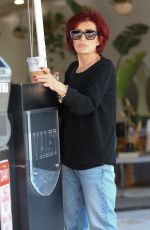 SHARON OSBOURNE Waits for Her Car at Valet in Beverly Hills 04/27/2023