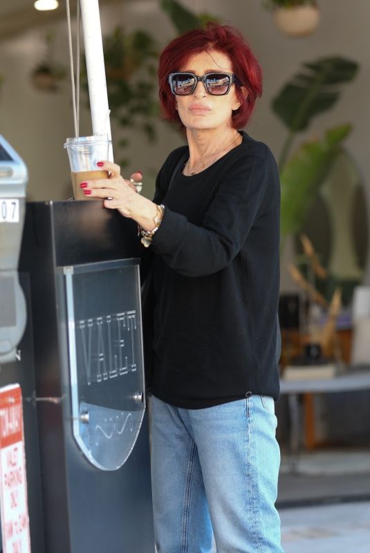 SHARON OSBOURNE Waits for Her Car at Valet in Beverly Hills 04/27/2023
