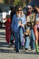 SUKI WTAERHOUSE Arrives at Revolve Party at Coachella 2023 Music Festival in Indio 04/15/2023