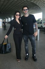 SUNNY LEONE Arrives at a Tterminal of Mumbai Airport 04/14/2023