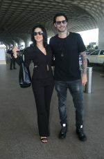 SUNNY LEONE Arrives at a Tterminal of Mumbai Airport 04/14/2023