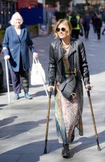 ZOE HARDMAN on Crutches Leaves Global Radio Studios in London 04/13/2023