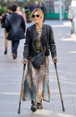 ZOE HARDMAN on Crutches Leaves Global Radio Studios in London 04/13/2023