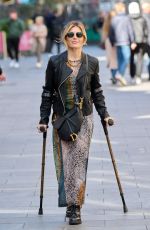ZOE HARDMAN on Crutches Leaves Global Radio Studios in London 04/13/2023