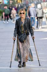 ZOE HARDMAN on Crutches Leaves Global Radio Studios in London 04/13/2023