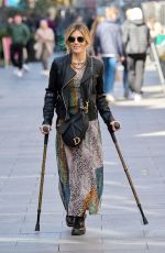 ZOE HARDMAN on Crutches Leaves Global Radio Studios in London 04/13/2023