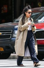 ZOE KRAVITZ Out for Coffee with a Friend in New York 04/24/2023