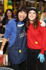 ZOEY DEUTCH at Feeding America Hosts Volunteer Event at L.A Regional Food Bank 04/07/2023
