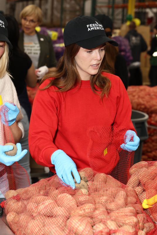 ZOEY DEUTCH at Feeding America Hosts Volunteer Event at L.A Regional Food Bank 04/07/2023
