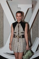 ALICIA VIKANDER at Louis Vuitton Cruise Show 2024 Photocall at Isola Bella 05/24/2023