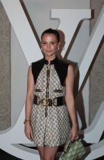 ALICIA VIKANDER at Louis Vuitton Cruise Show 2024 Photocall at Isola Bella 05/24/2023