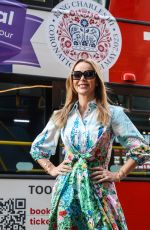 AMANDA HOLDEN Arrives at Heart Studios After Catching a Tour Bus Ahead of Kings Coronation in London 05/05/2023