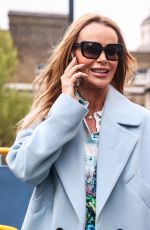 AMANDA HOLDEN Arrives at Heart Studios After Catching a Tour Bus Ahead of Kings Coronation in London 05/05/2023