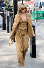ASHLEY ROBERTS Arrives at Heart Radio in London 05/03/2023