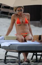 CHANTEL JEFFRIES in a Orange Bikini at a Beach in Miami 05/29/2023