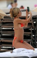 CHANTEL JEFFRIES in a Orange Bikini at a Beach in Miami 05/29/2023