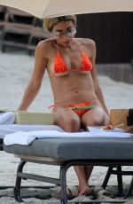 CHANTEL JEFFRIES in a Orange Bikini at a Beach in Miami 05/29/2023