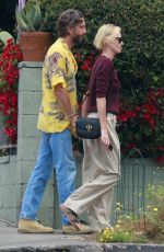 CHARLIZE THERON and Alex Dimitrijevic at All Time Restaurant in Los Angeles 05/16/2023