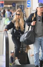CHRISTINA and Joshua HALL Arrives at LAX Airport in Los Angeles 04/30/2023