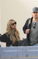 CHRISTINA and Joshua HALL Arrives at LAX Airport in Los Angeles 04/30/2023