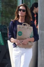 CINDY CRAWFORD Shopping at Whole Foods After Leaving a Spa in Malibu 05/09/2023