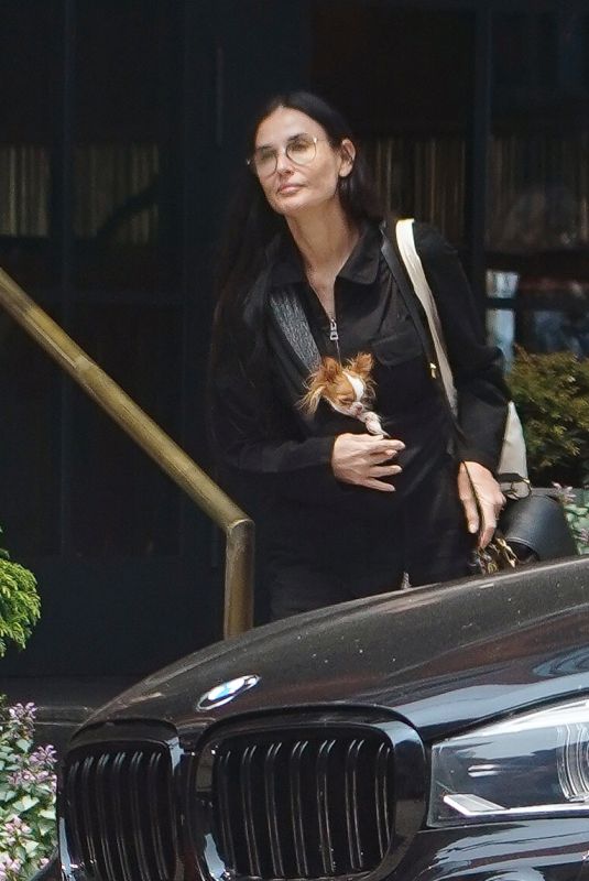 DEMI MOORE Out with Her Dog in New York 05/22/2023