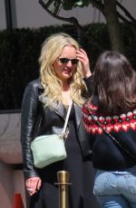 ELISABETH MOSS Smokes Between Two Scenes While Filming The Veil in Paris 05/17/2023