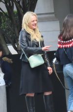 ELISABETH MOSS Smokes Between Two Scenes While Filming The Veil in Paris 05/17/2023