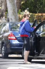 ELIZABETH OLSEN Out and About in Los Angeles 05/04/2023