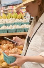 ELIZABETH OLSEN Shopping at Whole Foods in Los Angeles 04/29/2023