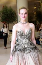 ELLE FANNING Leaves Hotel Martinez in Cannes 05/16/2023