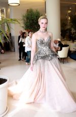 ELLE FANNING Leaves Hotel Martinez in Cannes 05/16/2023