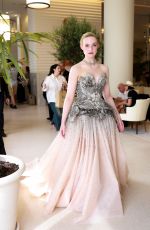 ELLE FANNING Leaves Hotel Martinez in Cannes 05/16/2023