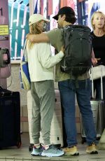 KATE BOSWORTH and Justin Long at Airport in Miami 05/19/2023