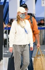 KATE BOSWORTH and Justin Long at Airport in Miami 05/19/2023