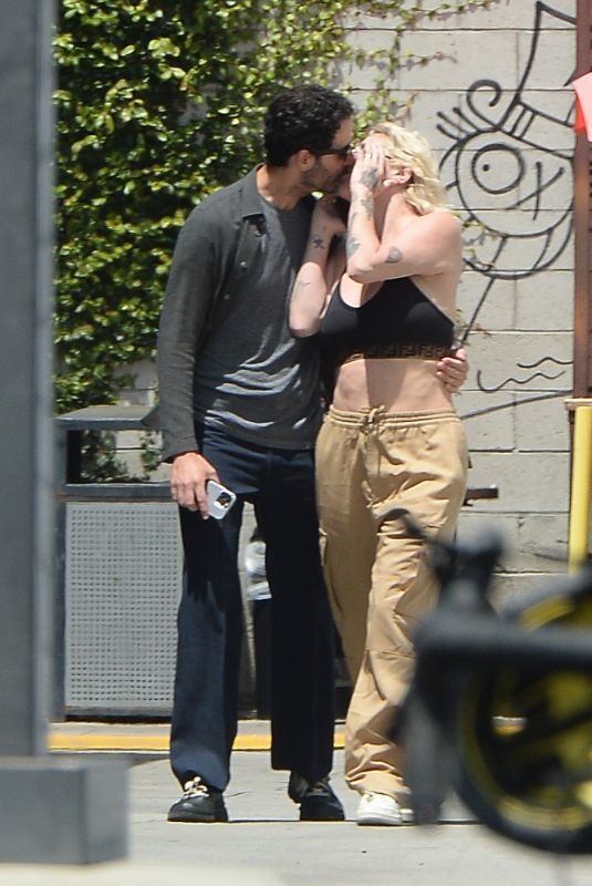 KESHA and Riccardo Maddalosso Out Kissing in Los Angeles 05/08/2023