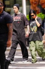KOURTNEY KARDASHIAN and Travis Barker Out at 5th Avenue in New York 05/19/2023