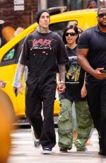KOURTNEY KARDASHIAN and Travis Barker Out at 5th Avenue in New York 05/19/2023