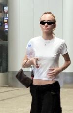 LILY-ROSE DEPP and 070 SHAKE Kissing at LAX Airport in Los Angeles 05/25/2023