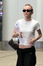 LILY-ROSE DEPP and 070 SHAKE Kissing at LAX Airport in Los Angeles 05/25/2023