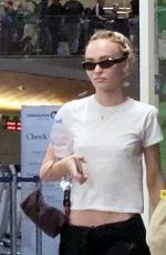 LILY-ROSE DEPP and 070 SHAKE Kissing at LAX Airport in Los Angeles 05/25/2023
