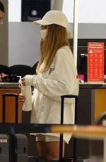 MARGOT ROBBIE Arrives at Airport in Australia 05/24/2023
