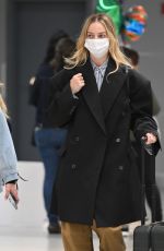 MARGOT ROBBIE Arrives at Airport in New York 04/30/2023