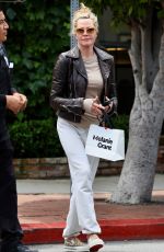 MELANIE GRIFFITH Leaves Melanie Grant Store in Los Angeles 05/11/2023 
